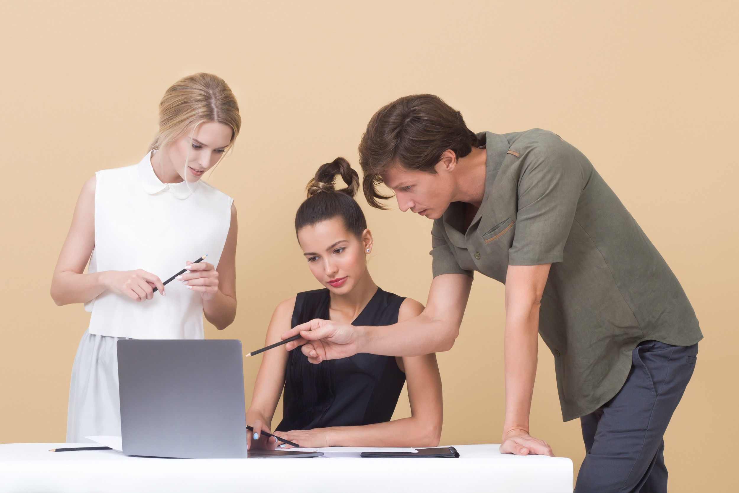 Employees discussing a project together after using Microsoft Teams to arrange a meeting